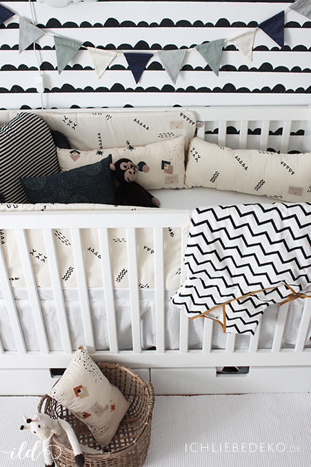 babybett-mit-trendy-bettwaren-von-nobodinoz