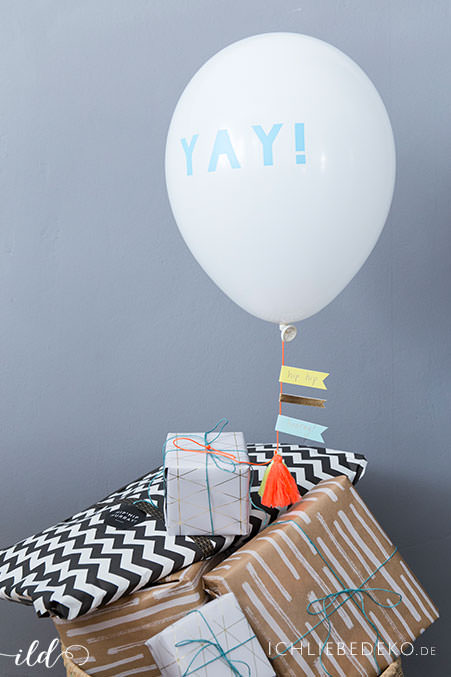 kreative-geschenkverpackung-fuer-babyparty-mit-luftballon-von-meri-meri